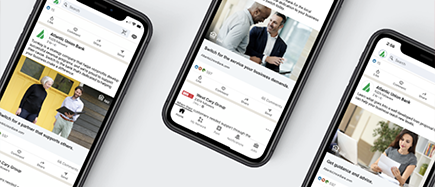 Three mobile phones showing Atlantic Union Bank Facebook feed