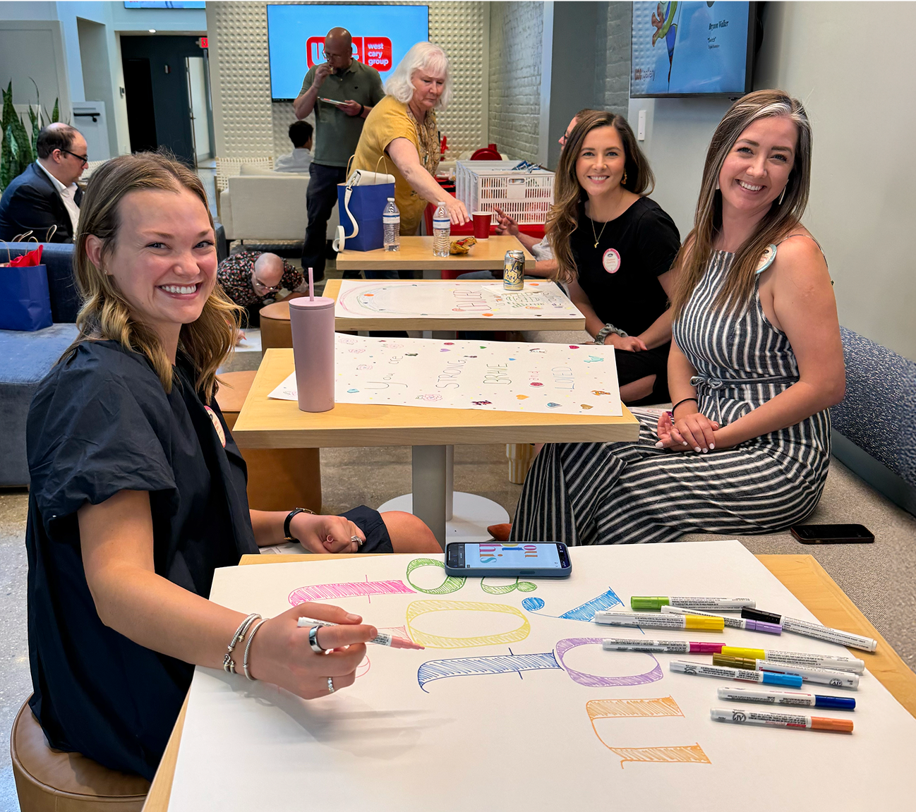 Article.Image.Placeholder Team members create posters for pediatric cancer patients and healthcare workers at our Art with Heart event benefitting JUST TRYAN IT